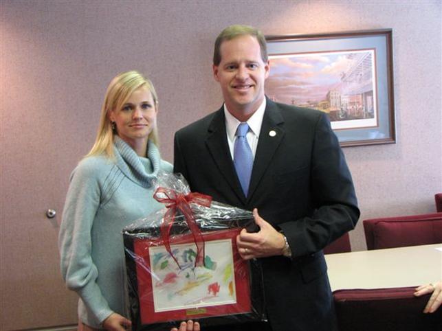Representative Cam Ward and Emily, mother of an autistic child