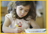 Young girl coloring